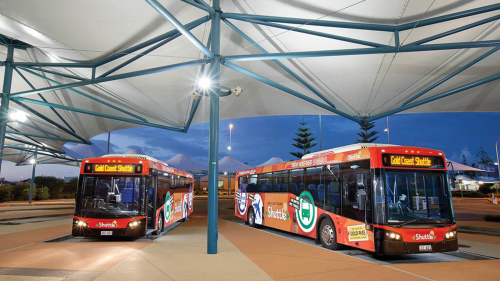 Shared Shuttle: Return Theme Park Transfer by Gold Coast Tourist Shuttle