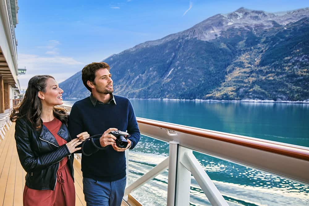 Couple overlooking the waterfront in Alaska