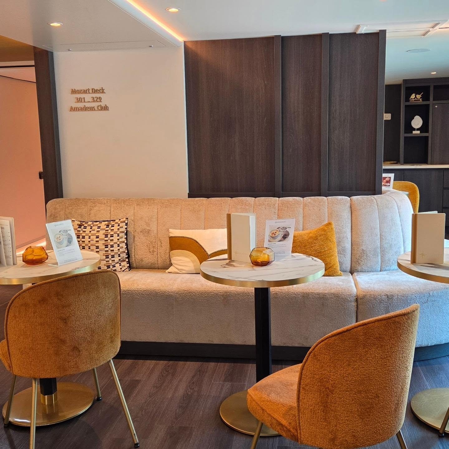 Mozart Deck suites corridor and Amadeus Club lounge aboard Amadeus Nova