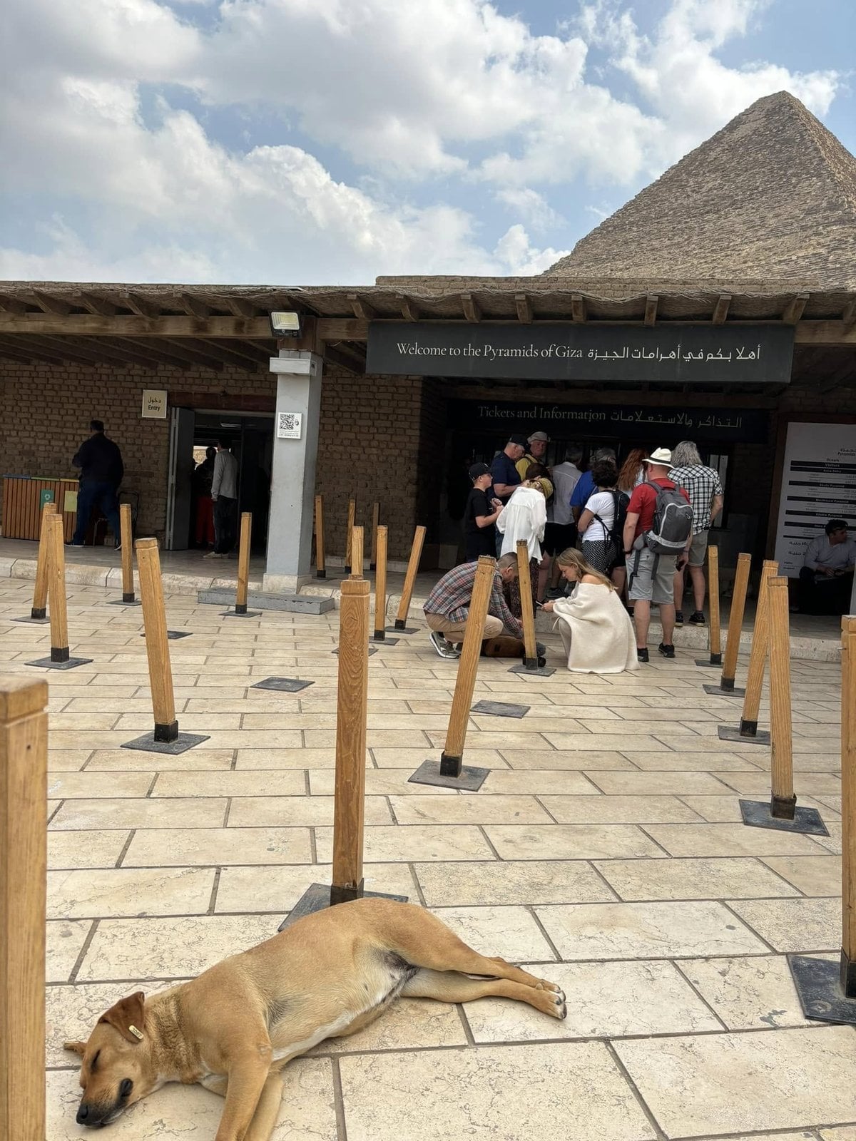 Entering the Giza Plateau complex with the peak of the Great Pyramid rising above