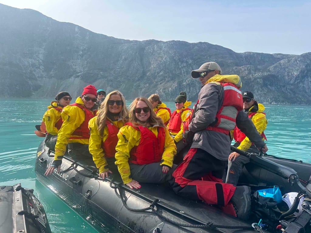 Jennifer Sampley and expedition group aboard Swan Hellenic Zodiac in Greenland