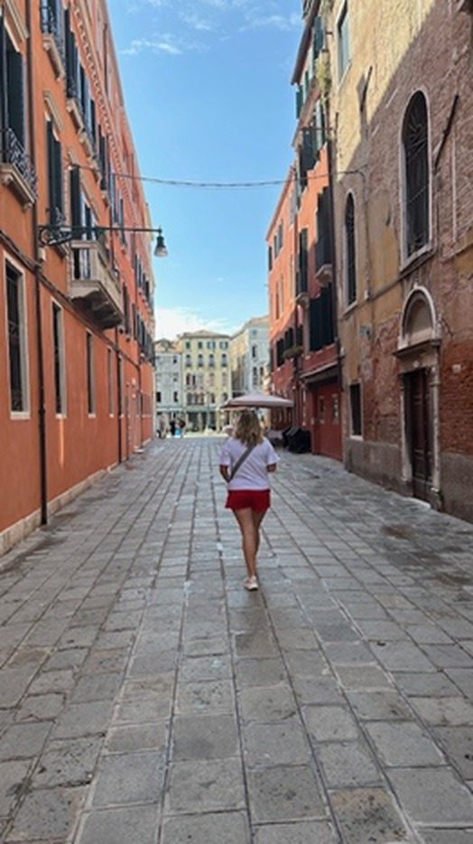 Exploring the picturesque cobblestone streets and historic architecture of Venice during a Mediterranean port call with Crystal Symphony