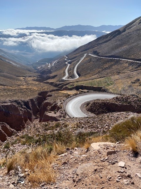 Winding switchback mountain road of Cuesta del Obispo ascending toward 11000 feet