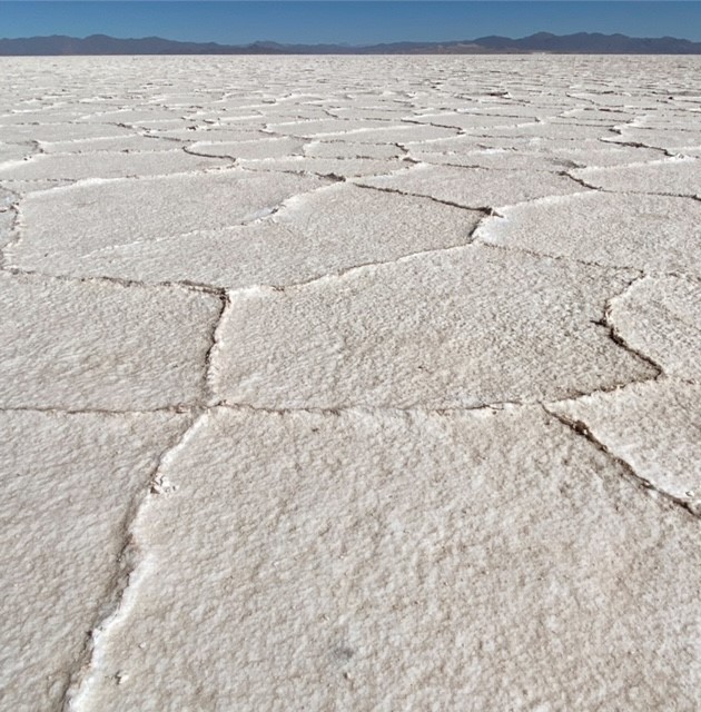 The blinding white expanse and hexagonal salt tiles of Salinas Grandes in Jujuy