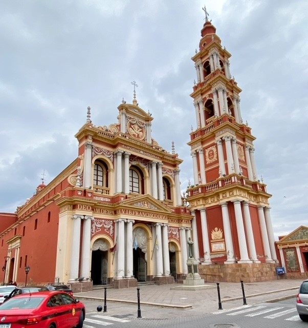 The iconic magenta and gold bell tower of San Francisco church in Salta