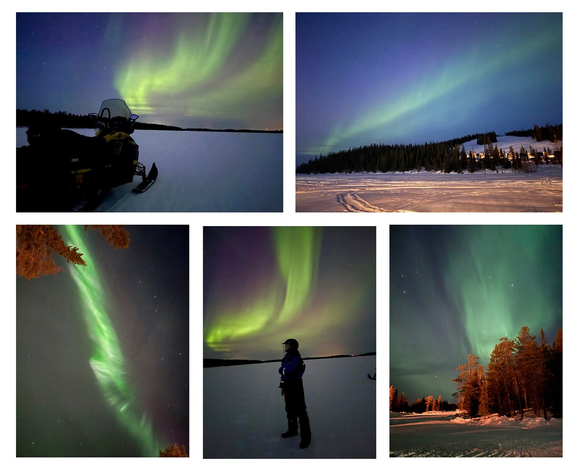 Snowmobiles parked across frozen lake under green Northern Lights