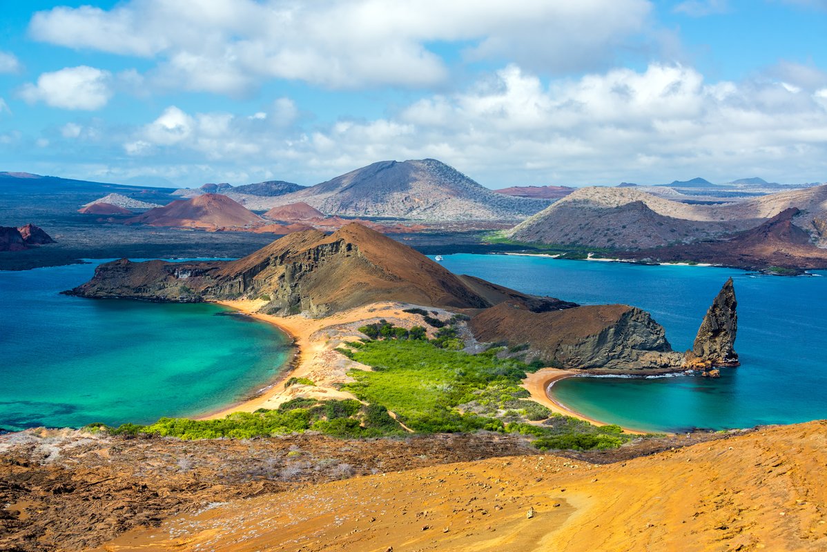Iconic viewpoint of Pinnacle Rock and twin crescent beaches on Bartolome Island