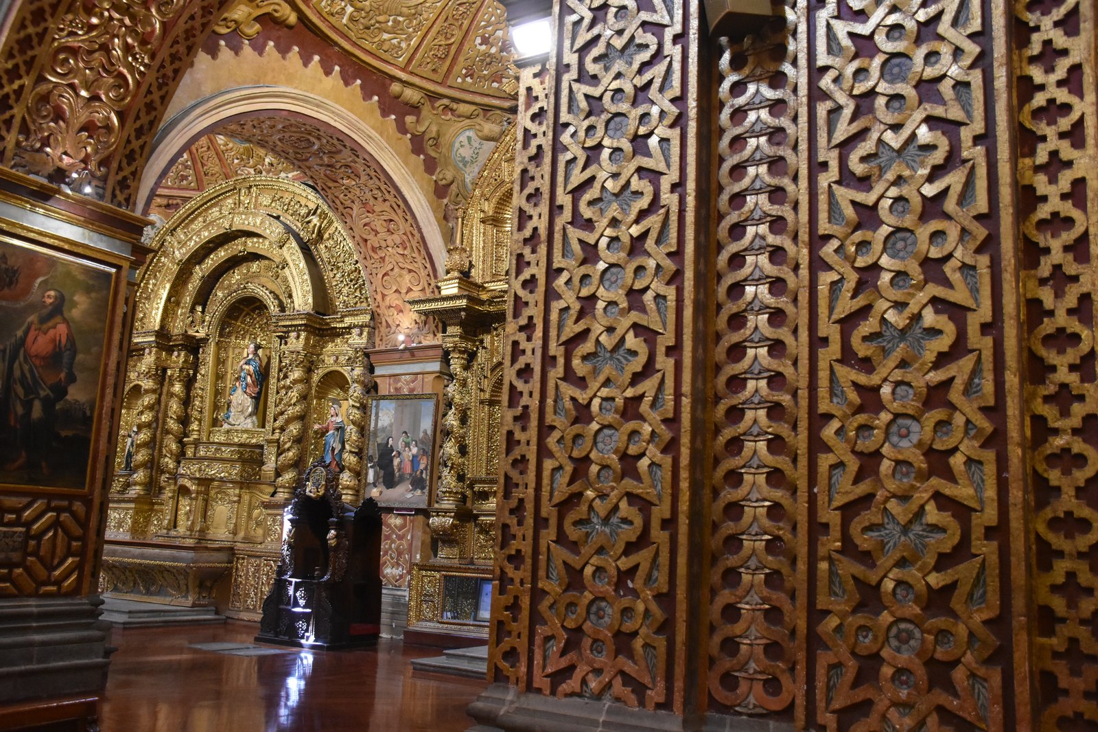 La Compania church ornate baroque stone facade in Quito