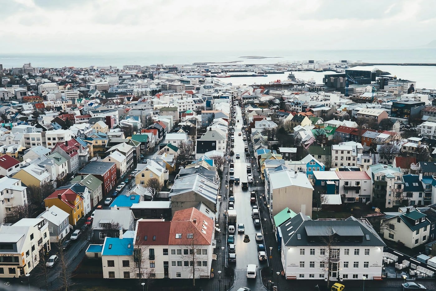 Reykjavik urban architecture, harbor, and mountain backdrop during golden hour in Iceland