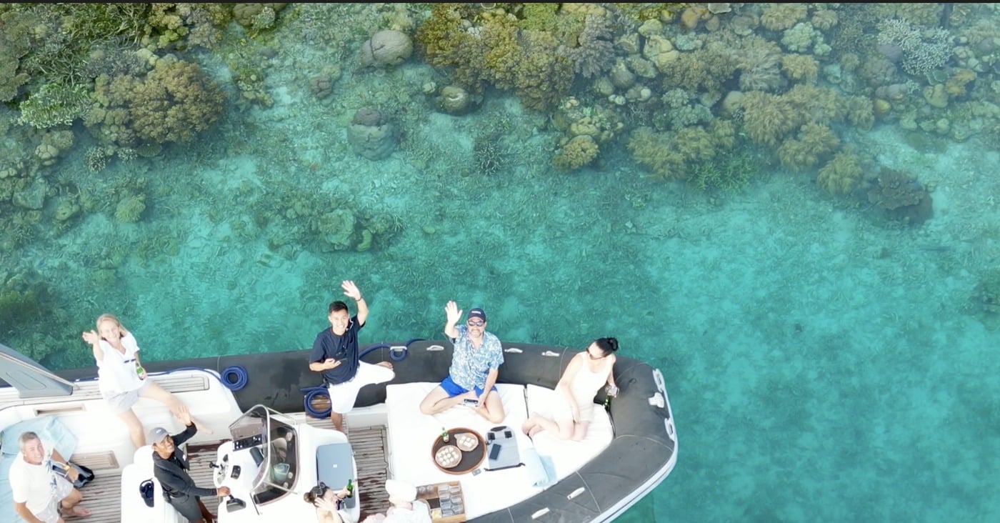 Vibrant hard and soft coral reef in crystal clear turquoise water Raja Ampat