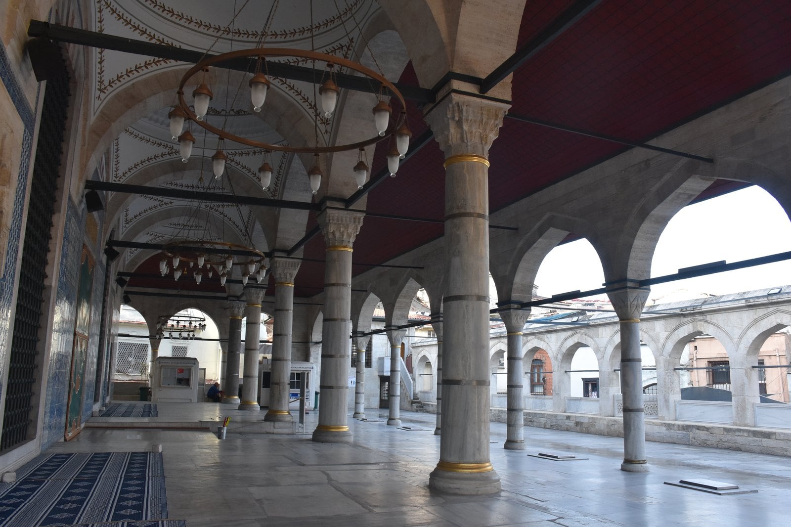 Intricate turquoise and cobalt blue Iznik tiles covering the interior walls of Rustem Pasa Mosque