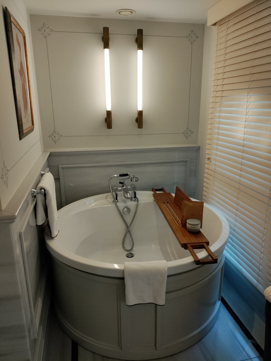 Luxurious bathroom with freestanding soaker tub in the Courtyard Suite at Six Senses Kocatas Mansions