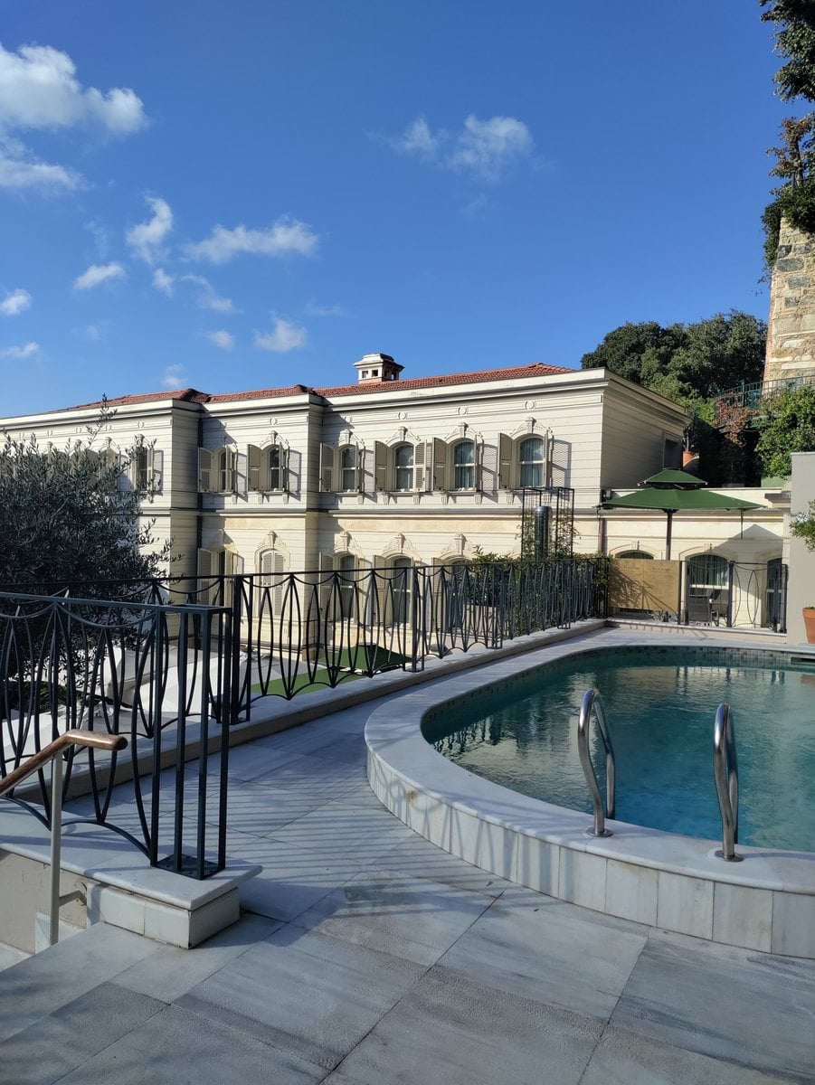 Outdoor swimming pool on the terraced hillside at Six Senses Kocatas Mansions