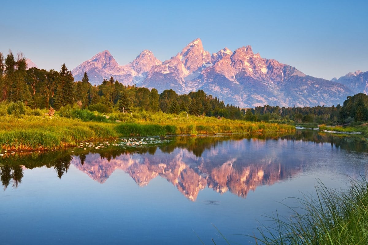 Grand Teton Cathedral Peaks reflecting in alpine waters
