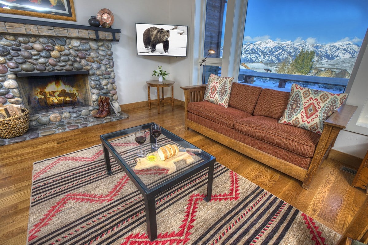 Spring Creek Ranch main luxury lodge exterior with Teton views