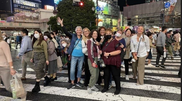 Shibuya Crossing intersection with thousands of pedestrians in Tokyo