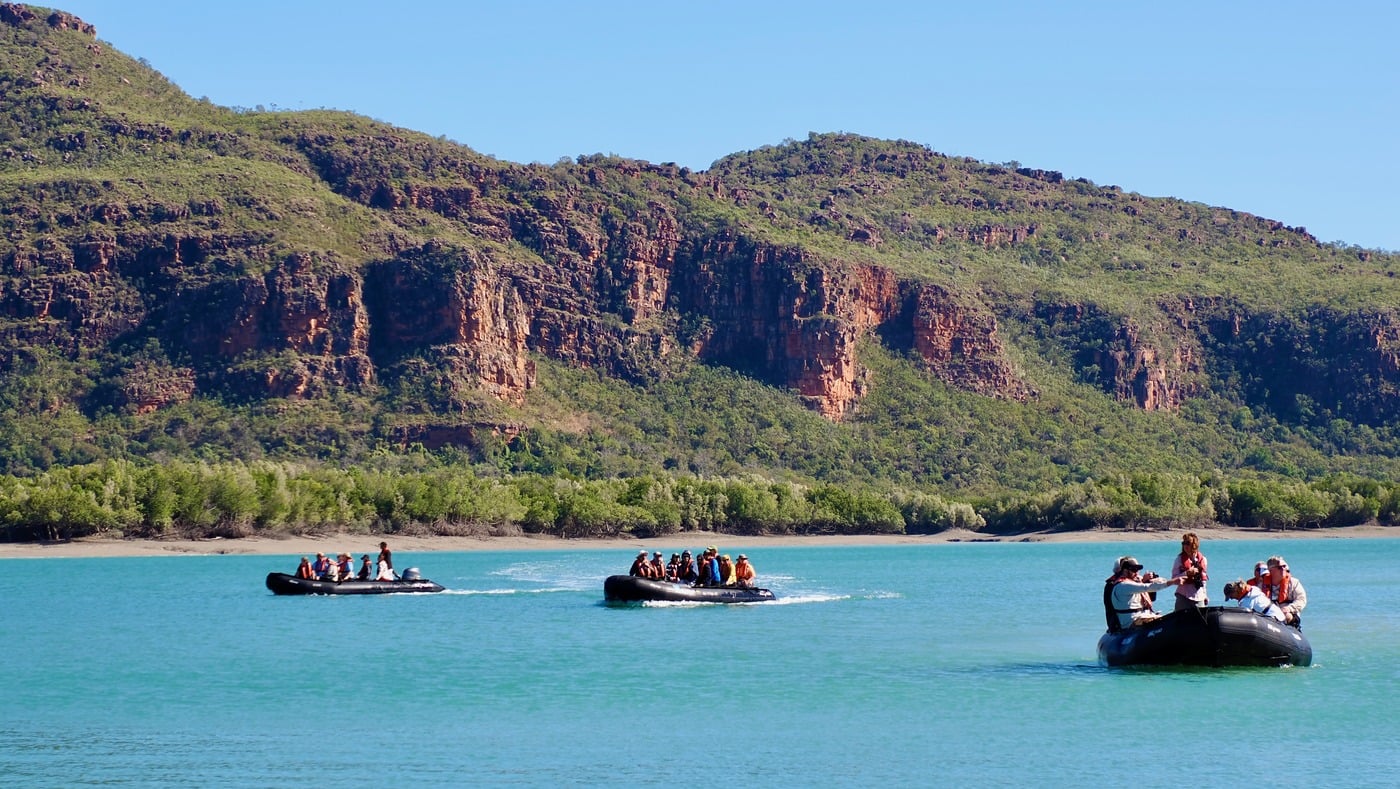 Expansive ochre cliffs and turquoise sea along the uninhabited Kimberley coastline