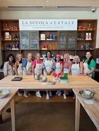 Travel advisors participating in an artisan bread-making masterclass at La Scuola di Eataly