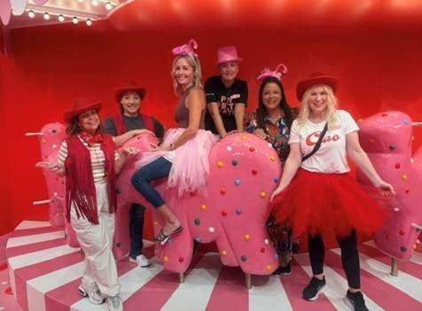 Travel advisors enjoying playful interactive exhibits at the Museum of Ice Cream Miami