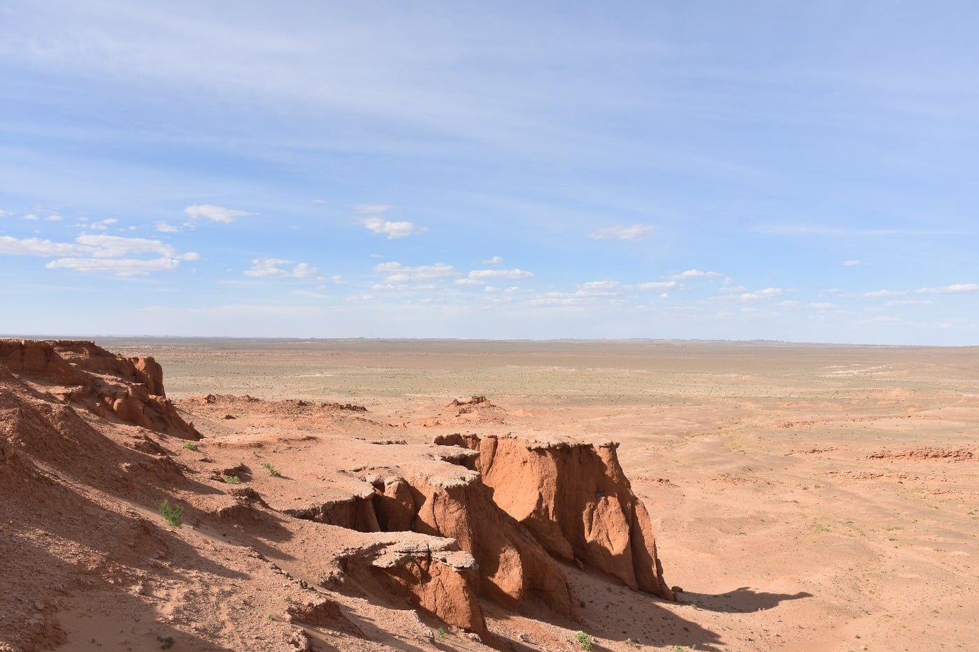 The dramatic red sandstone cliffs of Bayanzag in the Gobi Desert