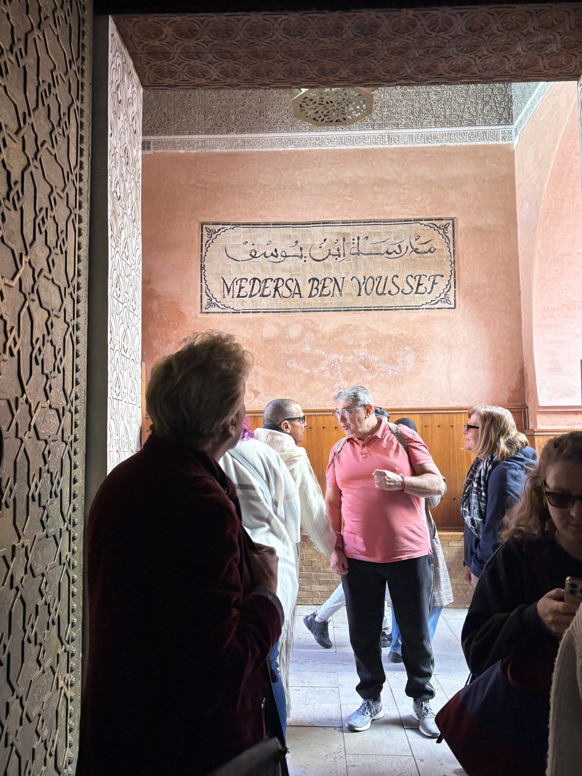 Ben Youssef Madrasa intricate carved stucco arches