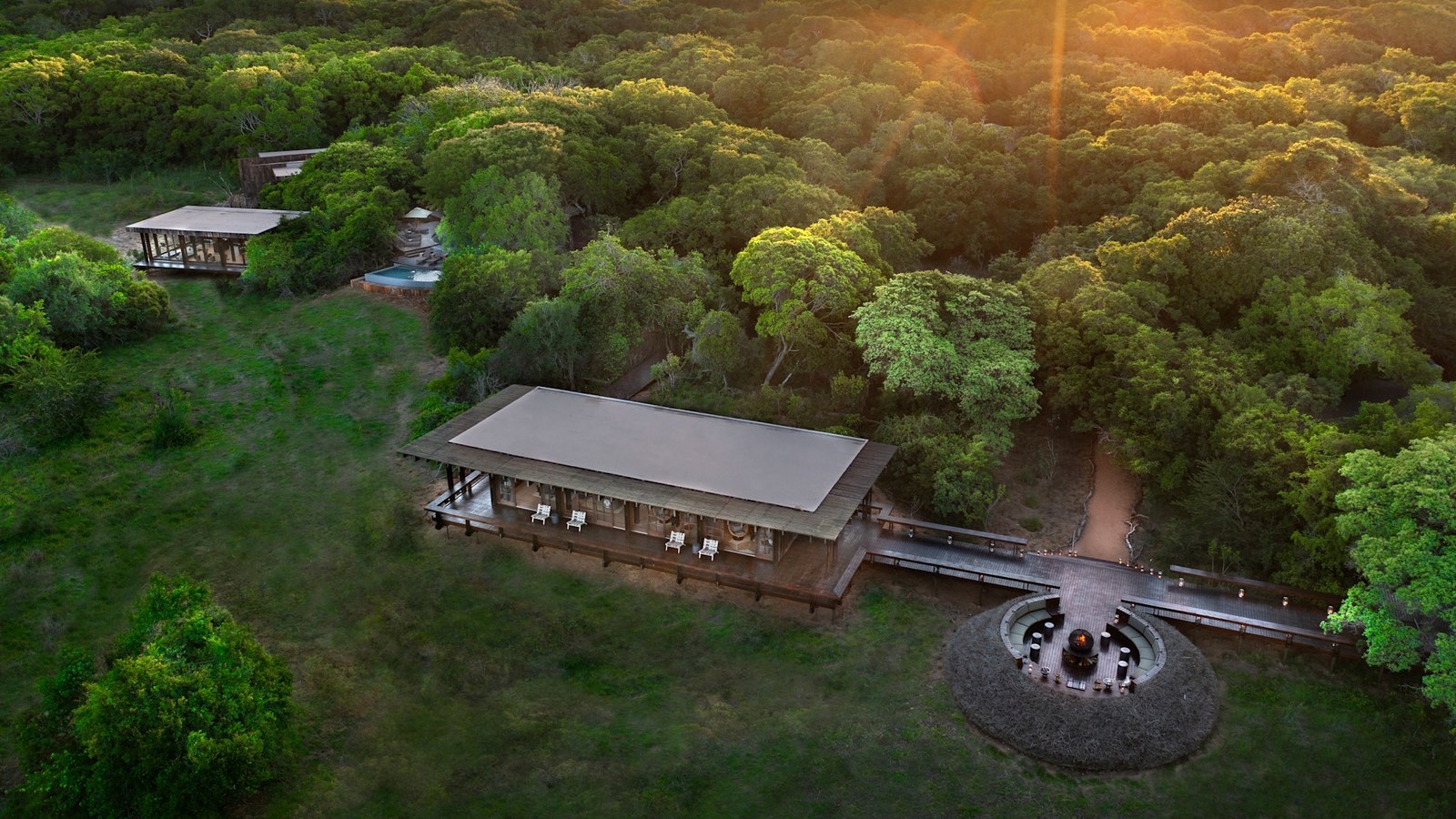 Central firepit gathering area at andBeyond Phinda Forest Lodge