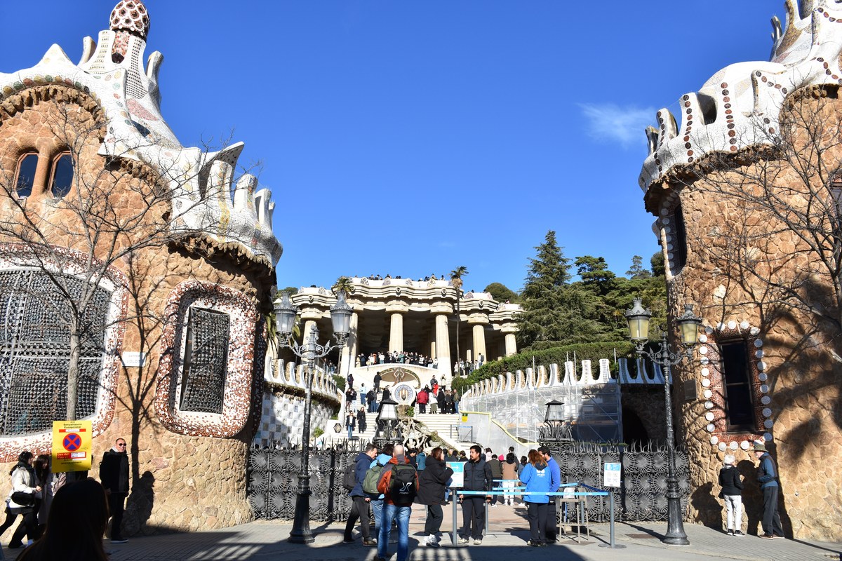 Park Guell entrance pavilions and Gaudi dragon stairway in Barcelona