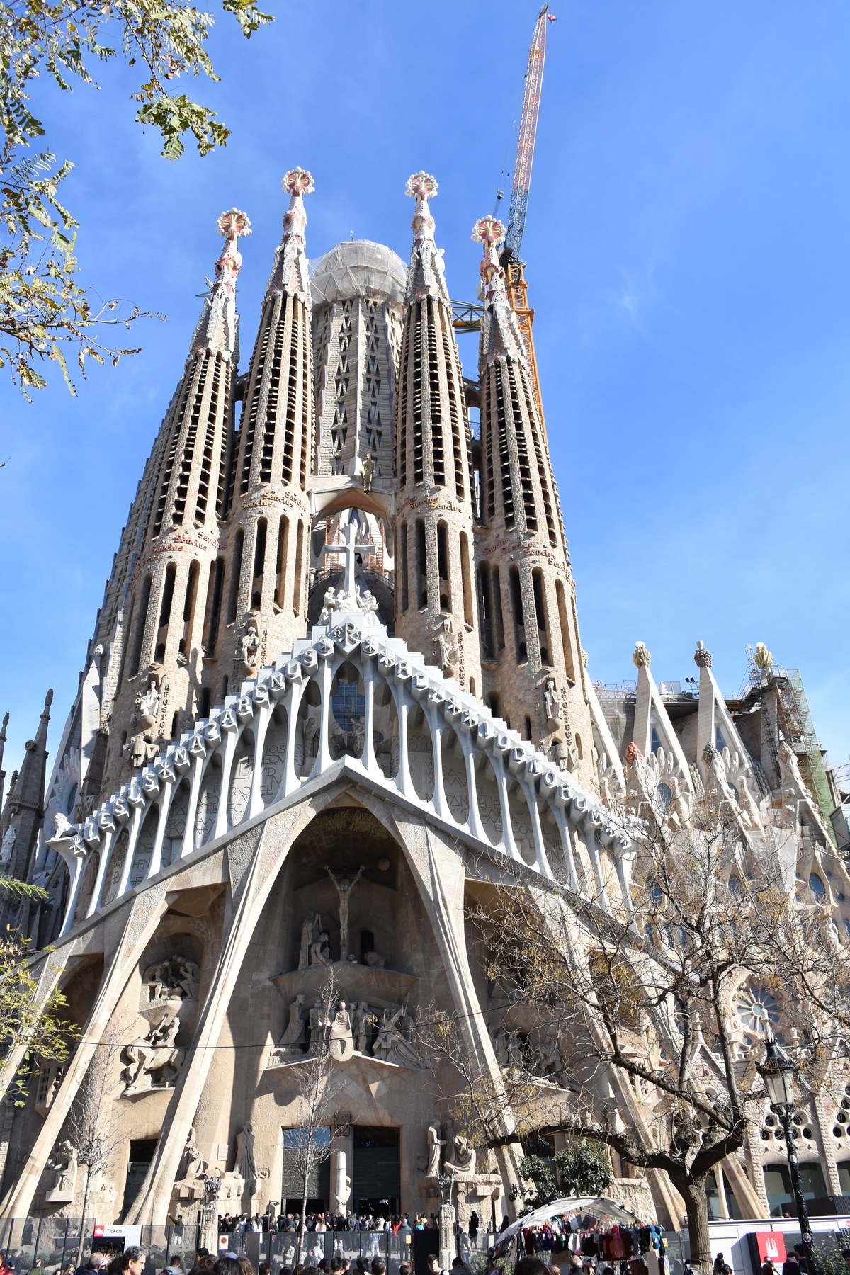 Soaring spires and Passion Facade of Sagrada Familia in Barcelona