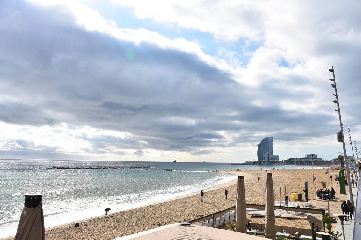 Barceloneta beach in Barcelona with W Hotel and Mediterranean coastline