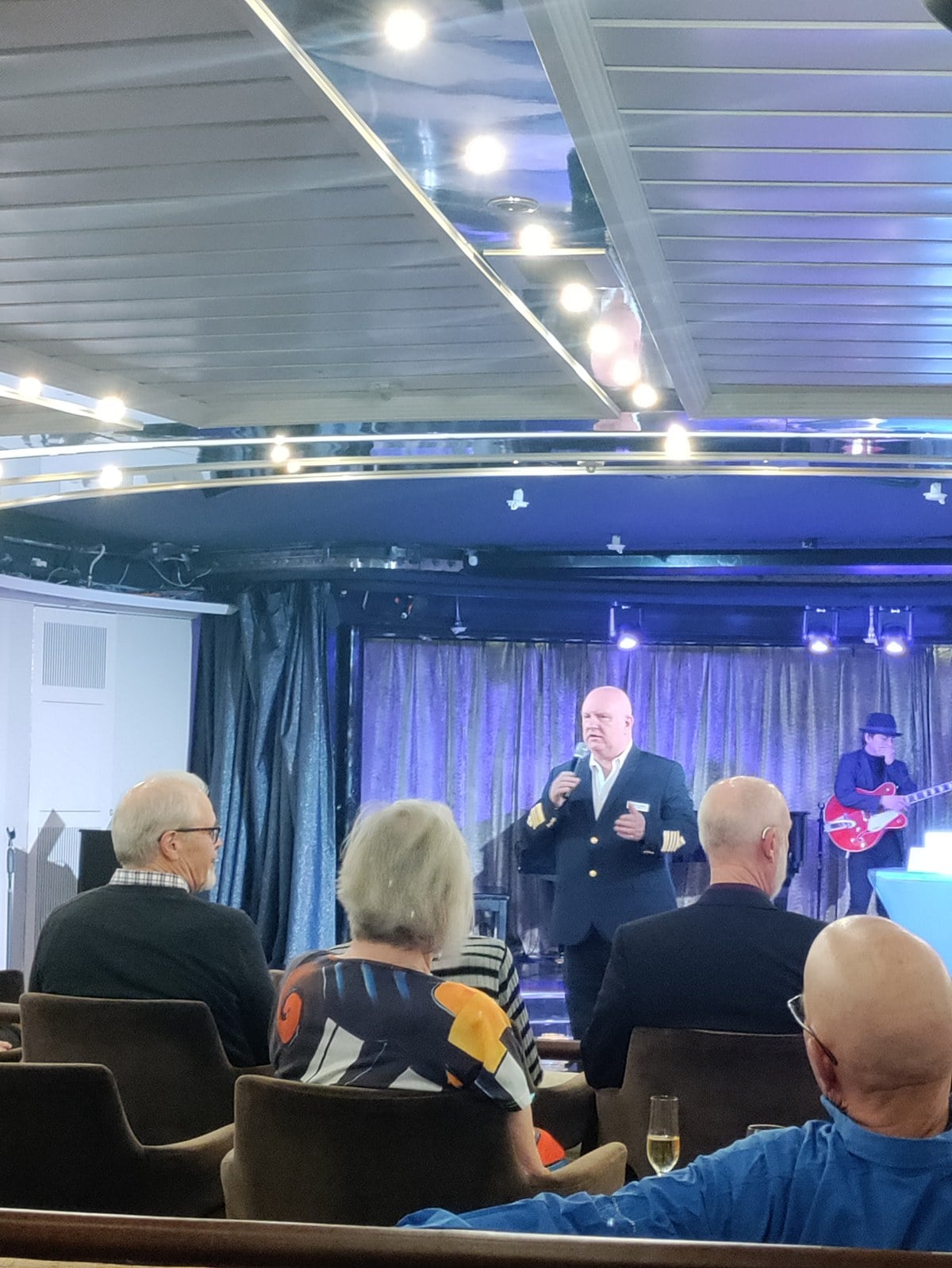 Captain presenting in the lounge aboard Windstar Star Legend