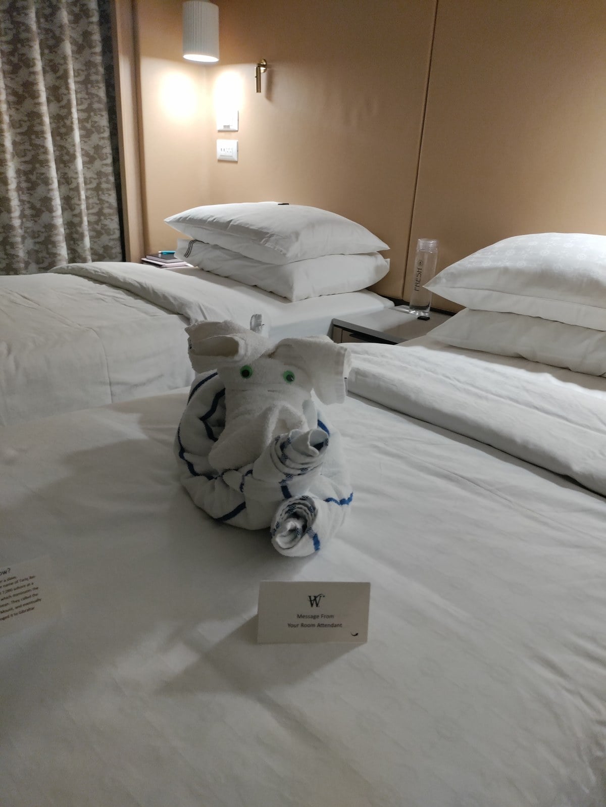 Luxury stateroom aboard Windstar Star Legend with welcome towel elephant