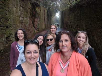 Hiking through mountain trails in comfortable layered clothing