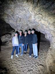 Walking through the underground passages of Cueva del Viento lava tube