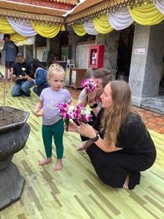 Riding traditional rickshaw through historical Chiang Mai streets