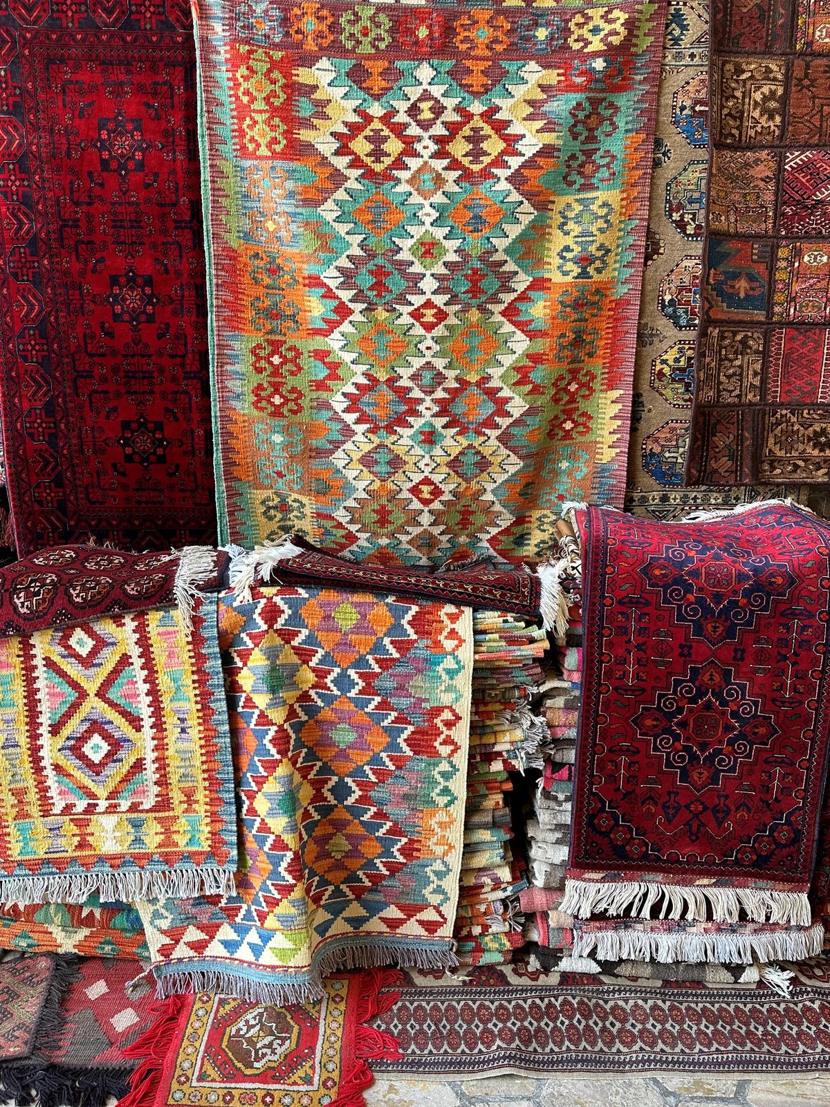 Hand-knotted Silk Road carpets inside Bukhara covered trading domes