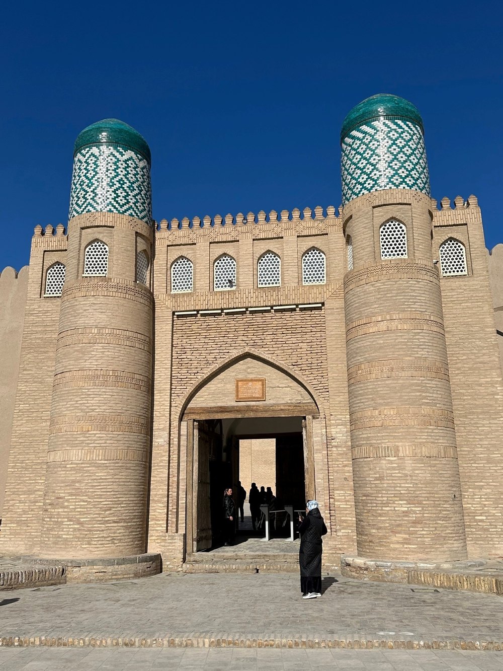 Ichon Qala fortress gate and mudbrick ramparts in Khiva