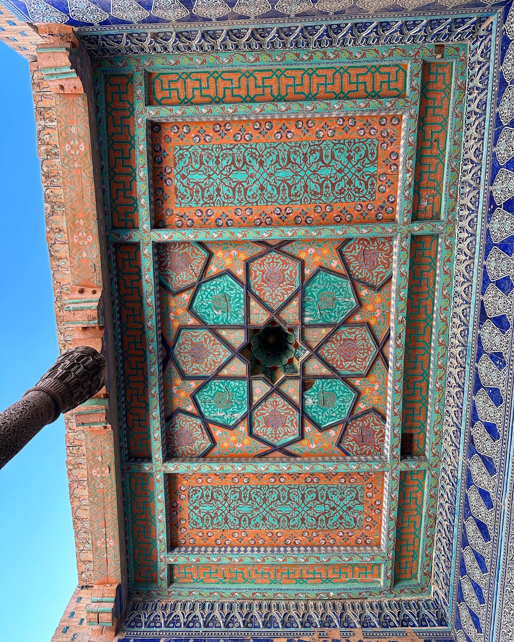 Elaborately carved and painted wooden ceiling in Khiva