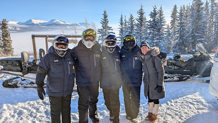 Advisors suited up for snowmobiling on Tagish Lake