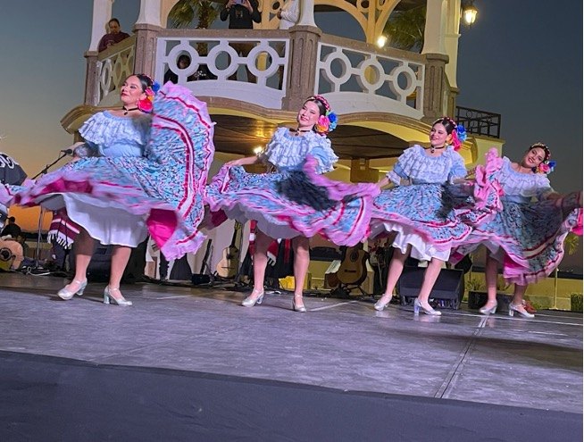 Colorful traditional Mexican dresses and dancers in La Paz