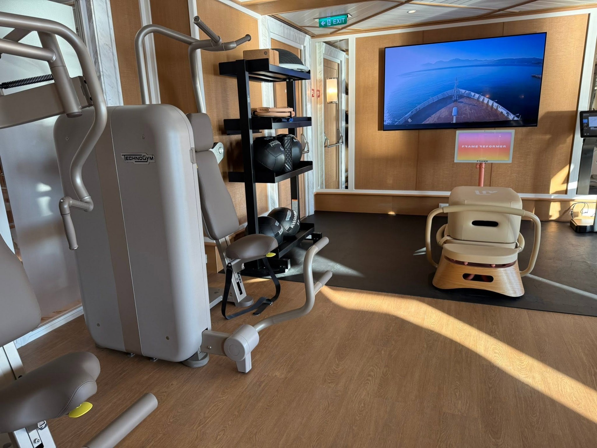 Strength training studio and wellness equipment aboard Four Seasons Yachts