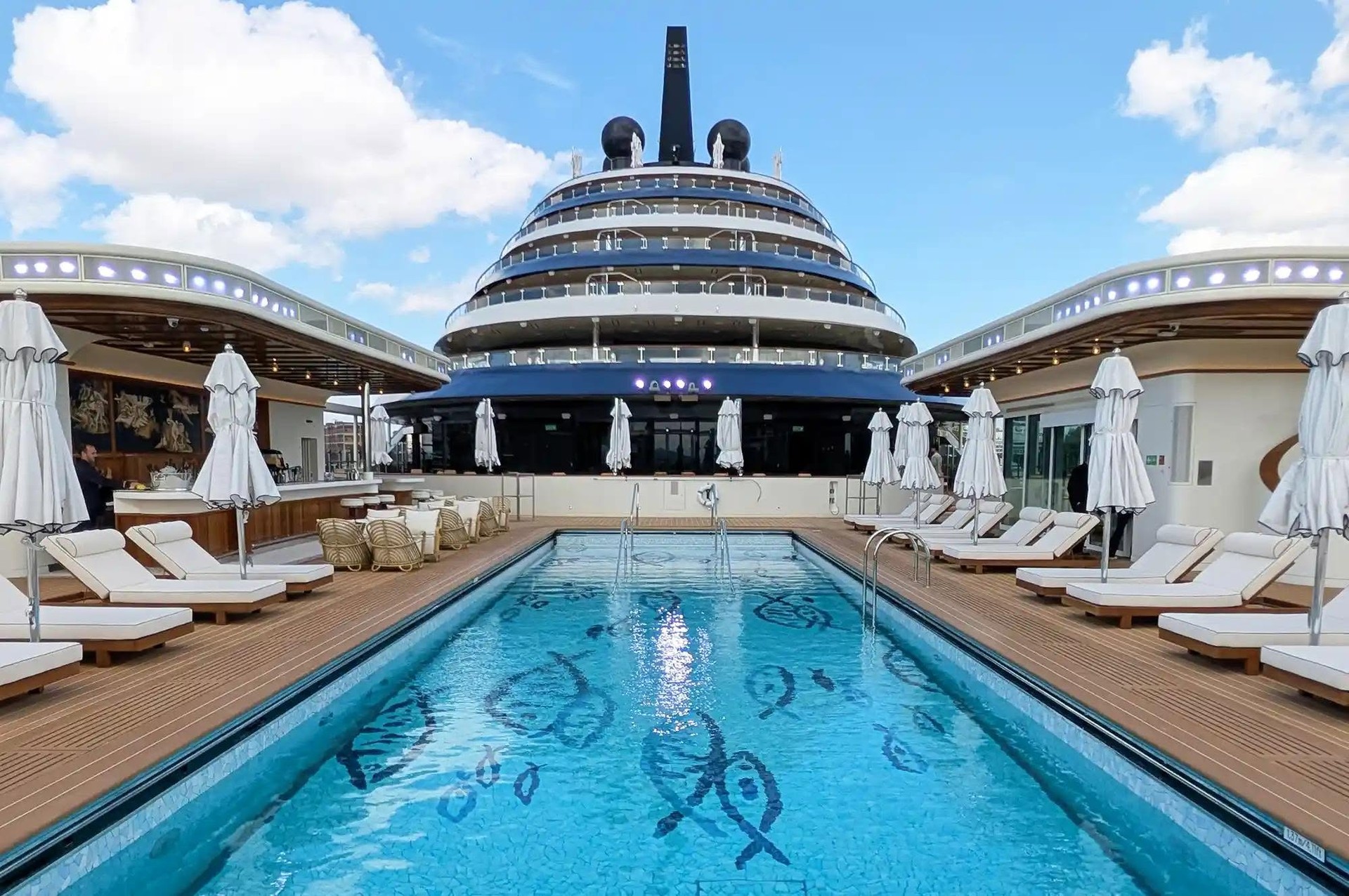 The iconic 20-meter saltwater lap pool with mosaic tile floor on Four Seasons Yachts
