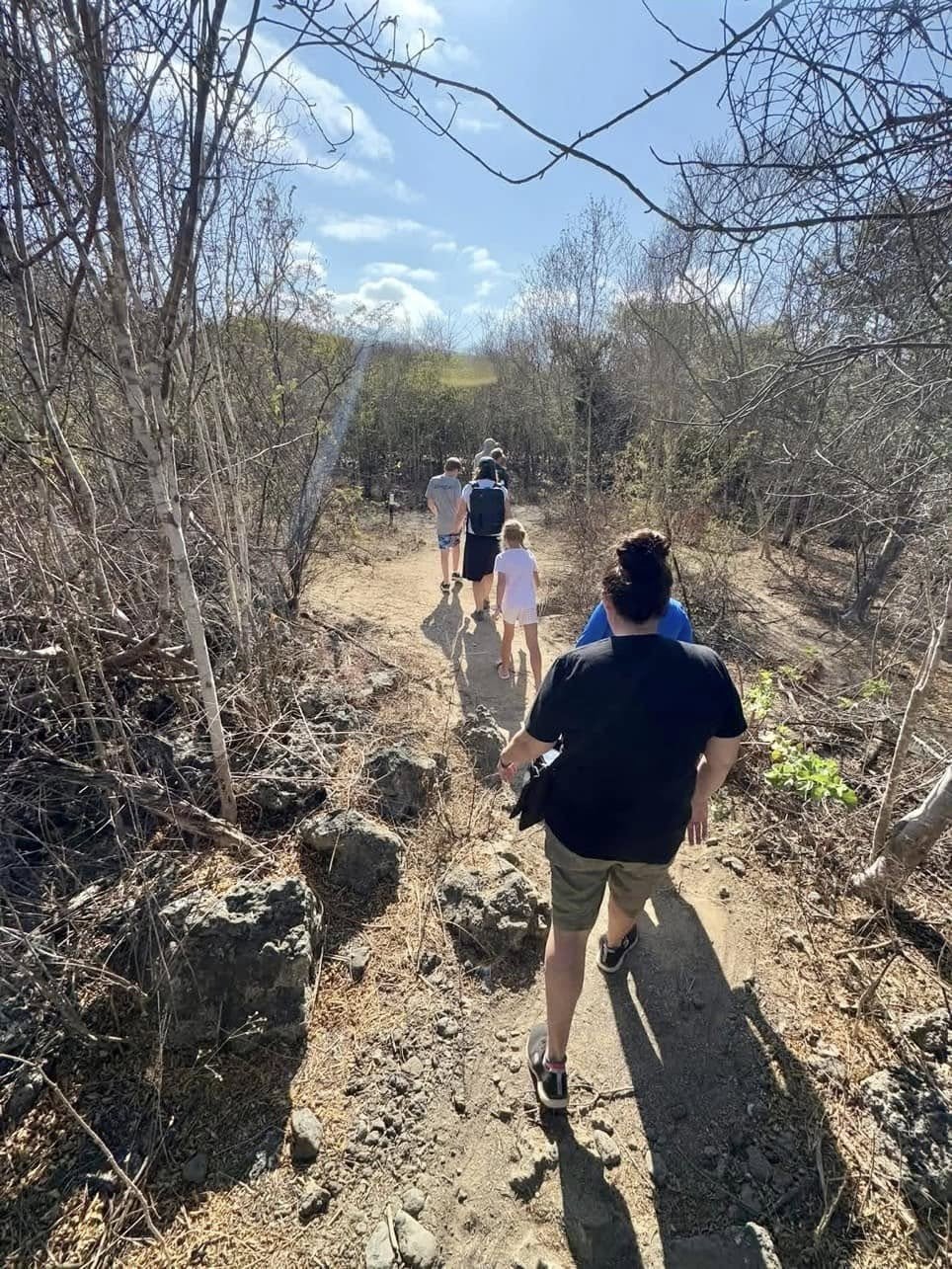 Hiking the coastal trail at Urbina Bay on Isabela Island with our Adventures by Disney naturalist guide