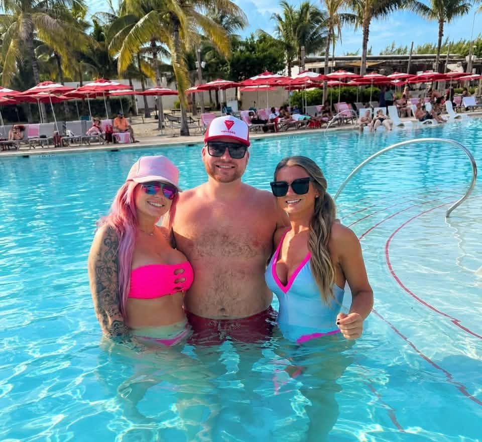 Logan White and friends in the lagoon pool at The Beach Club at Bimini