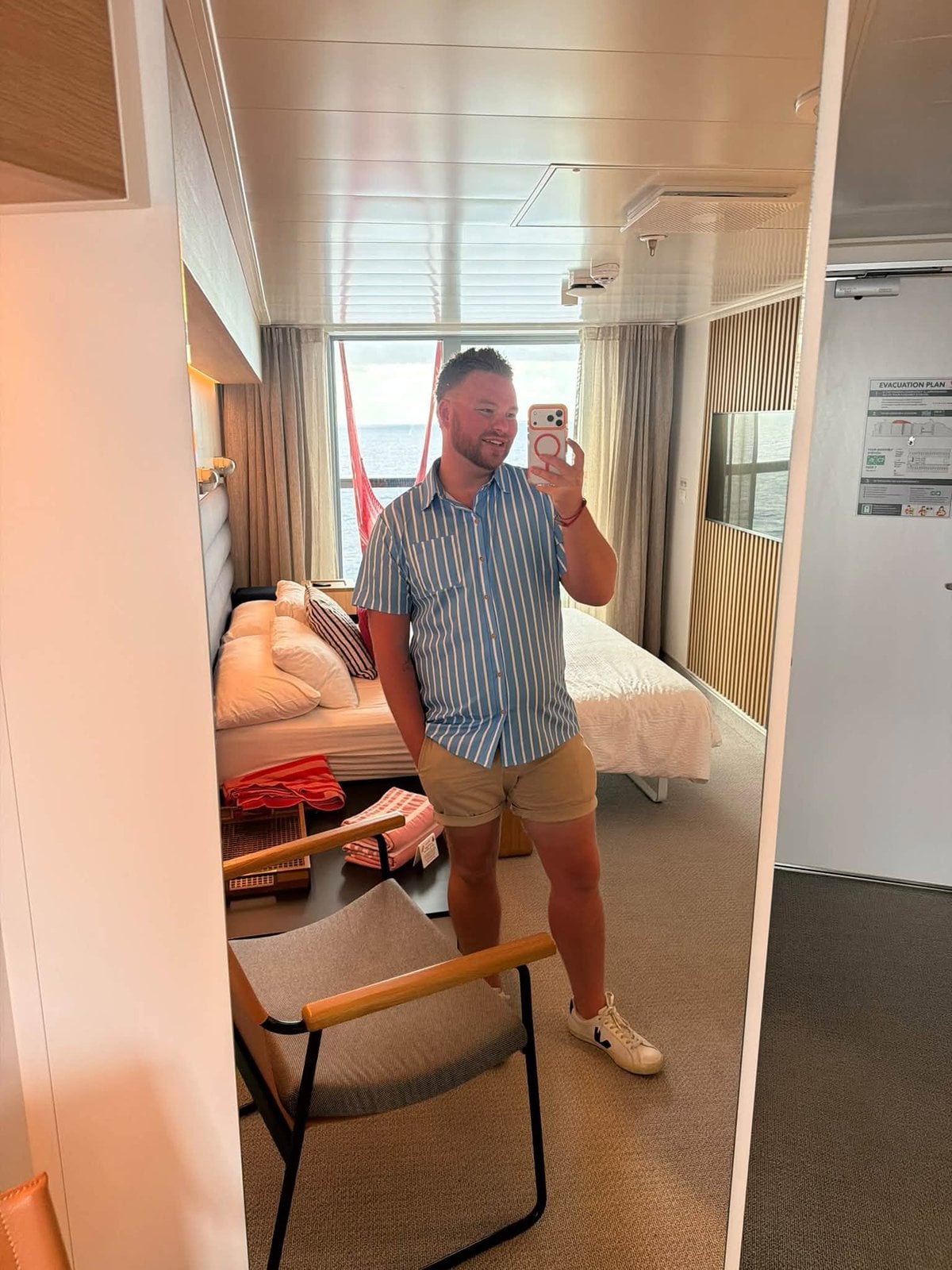 Ready for a day ashore in the spacious Sea Terrace cabin aboard Scarlet Lady