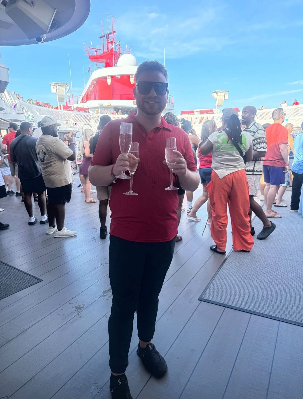 Celebrating sail-away aboard Virgin Voyages' Scarlet Lady with complimentary champagne
