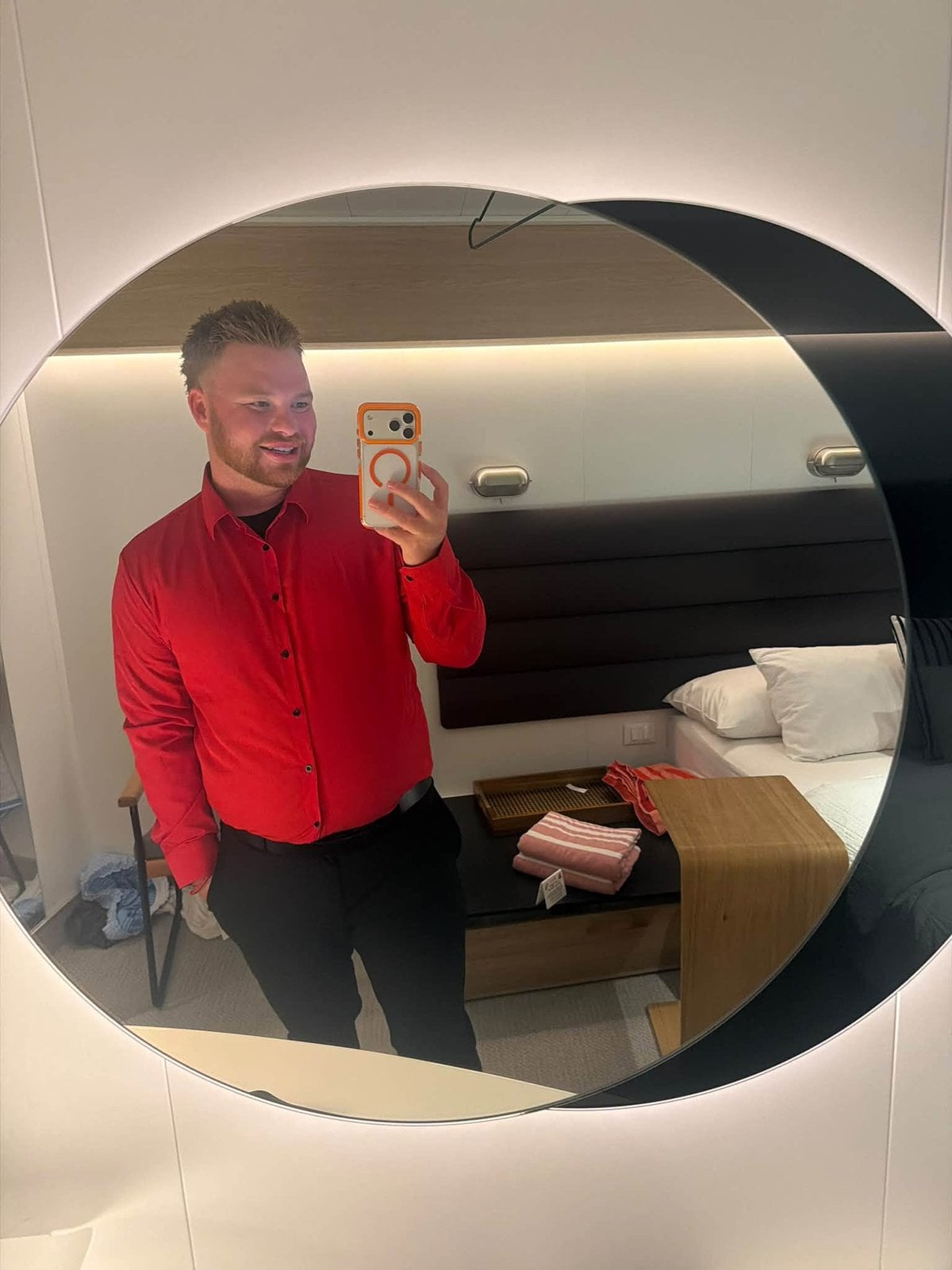 Getting ready for Scarlet Night in the Sea Terrace cabin's circular lighted vanity mirror