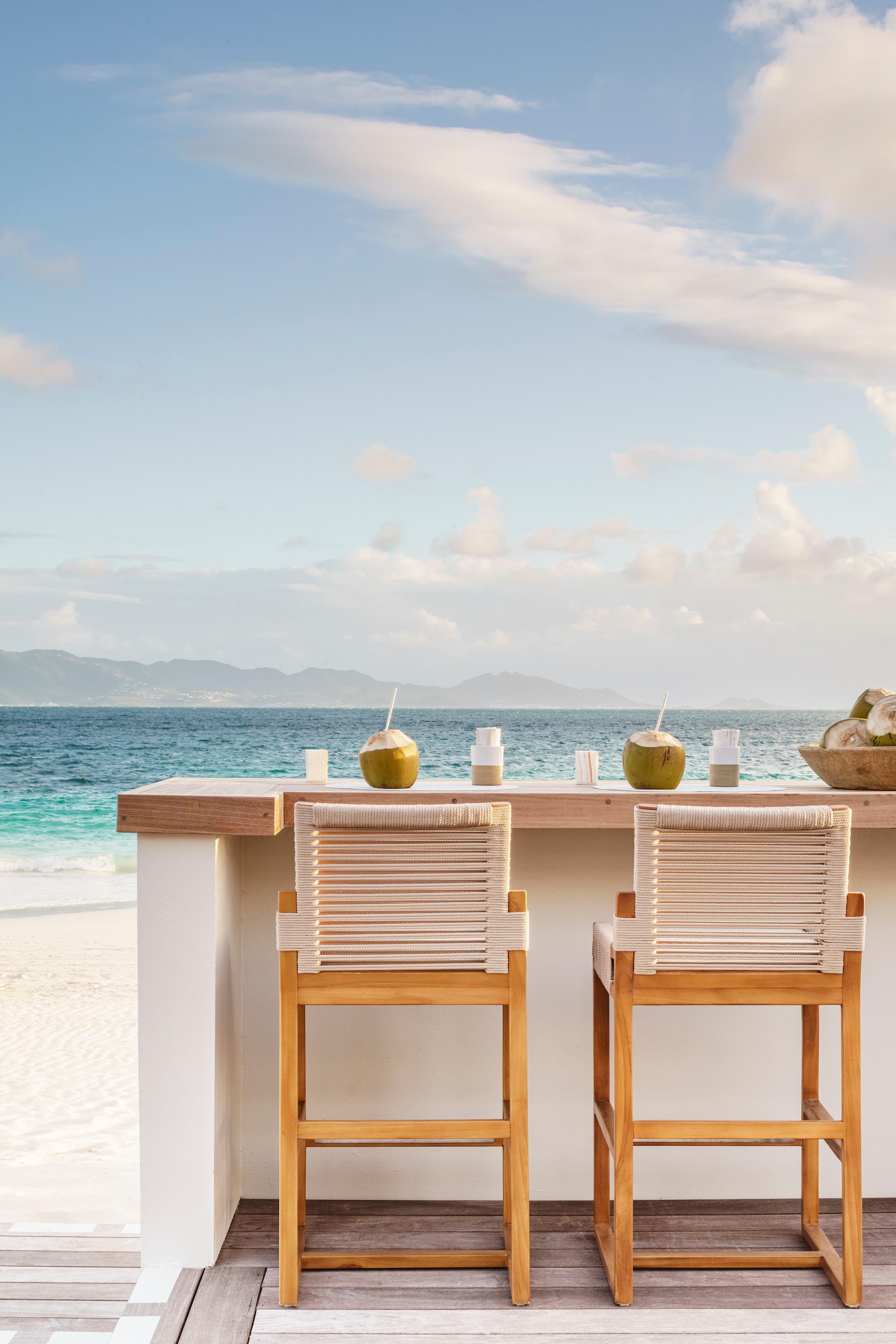 C Level beachfront dining and sunset bar on Rendezvous Bay