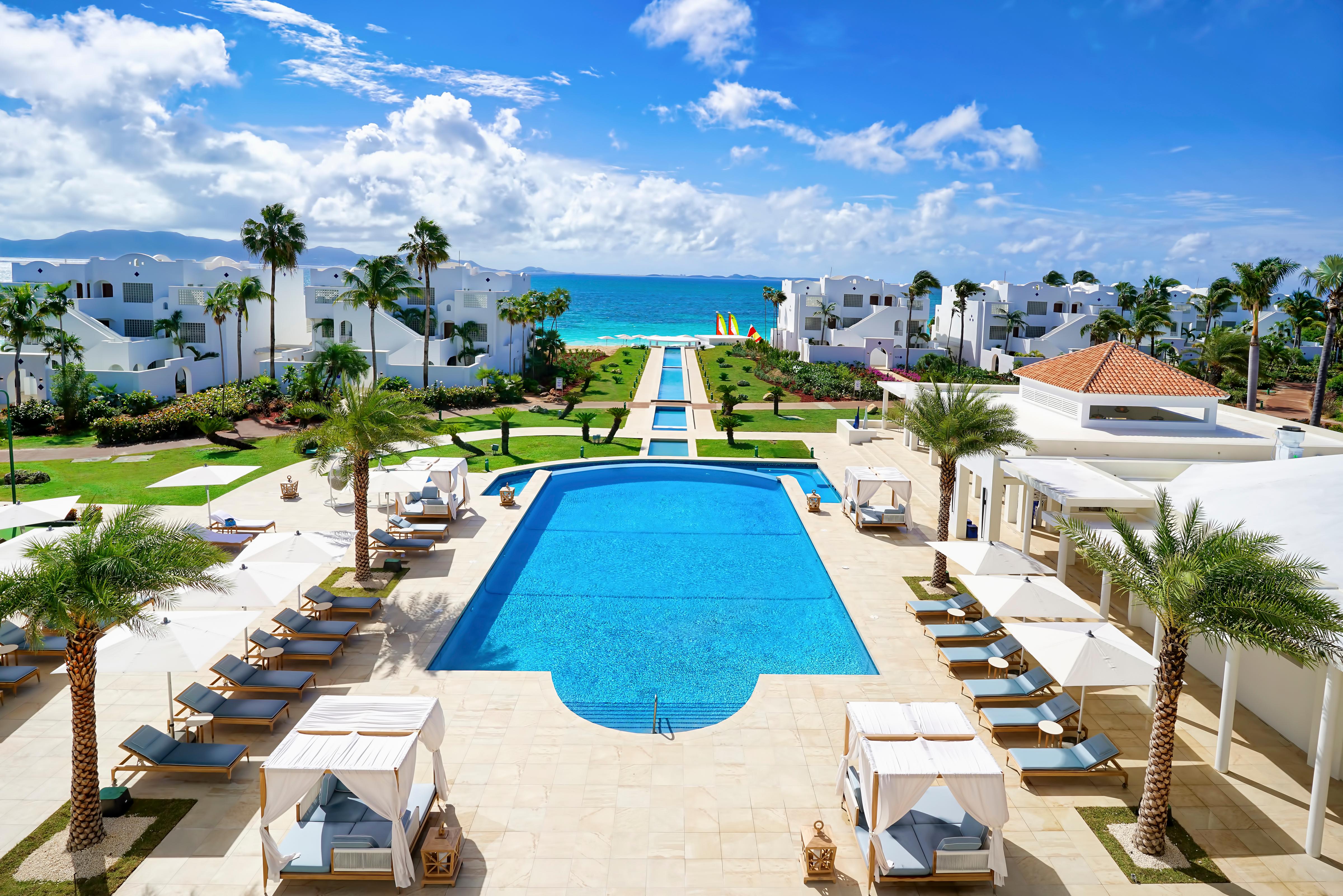 Mediterranean architecture and central swimming pool at Aurora Anguilla