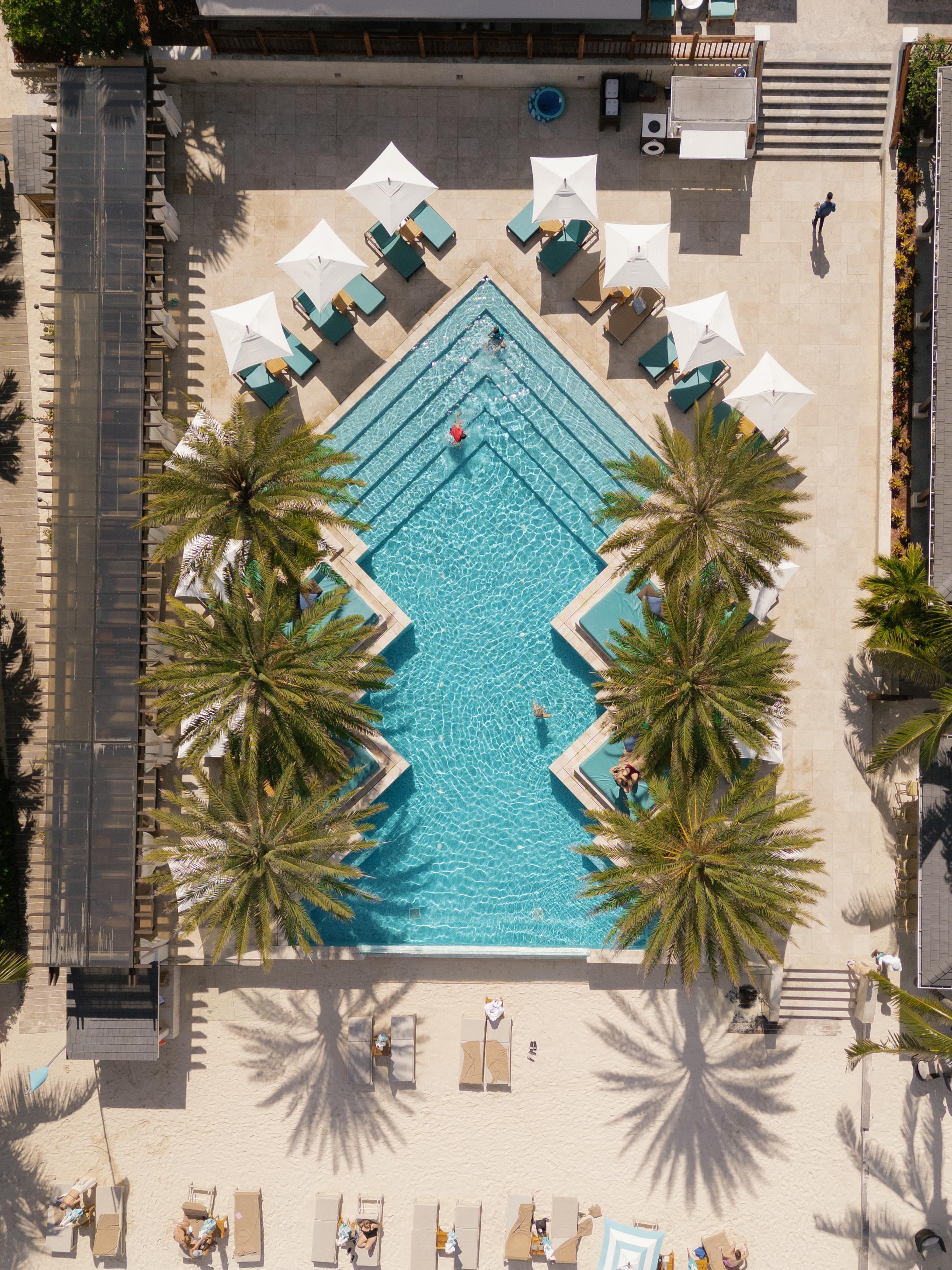 Aerial view of oceanfront pools at Zemi Beach House