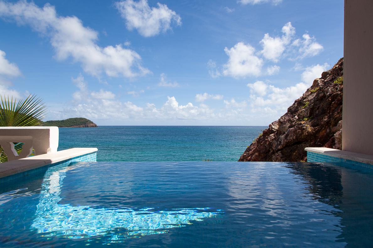 Curtain Bluff Bay Beach and Thatched Palapas